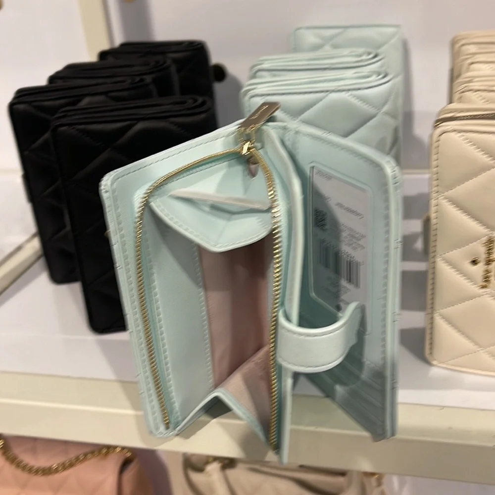 Kate Spade Carey Medium Compartment Bifold Wallet 
COLOR: Turquoise - Picture 8 of 16